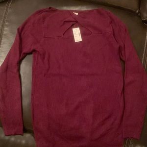 Fitted sweater with keyhole neckline.   NWT.  Comfortable.  Burgundy/Wine color.
